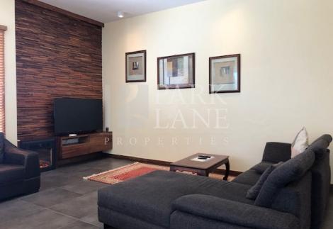Charming Fully Furnished 3-Bedroom Apartment with Mountain Views, Veranda, and Covered Parking