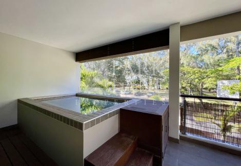 Beach access is just a short stroll from this lovely property.