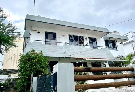 House divided into 2 parts with roof terrace