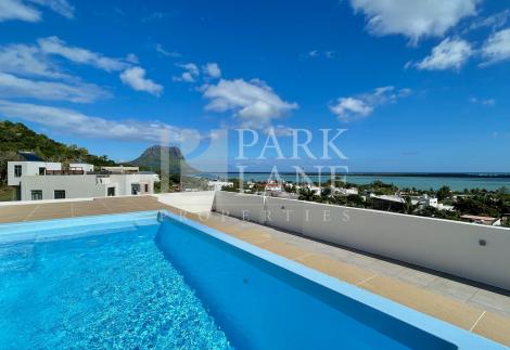 Modern 3-Bedroom Apartment with Sea Views & Rooftop Pool in La Gaulette