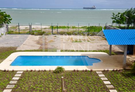 Modern beachfront duplex with pool near Port Louis