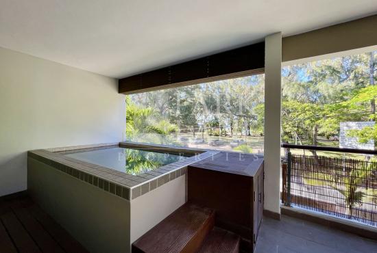 Beach access is just a short stroll from this lovely property.