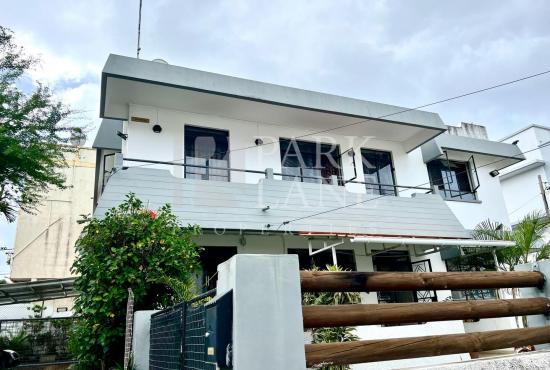 House divided into 2 parts with roof terrace